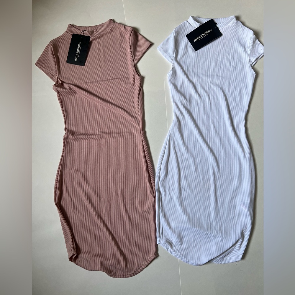 NWT , 2 size ZERO dress   Knit . Light pink and white